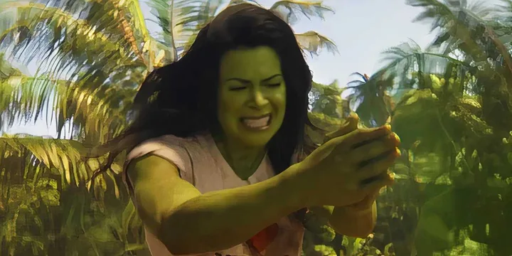 She-Hulk character straining outdoors among tropical palm trees in a pink outfit.