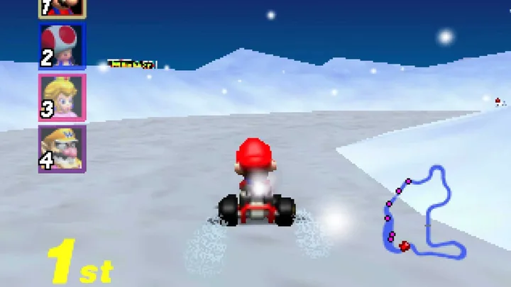 Mario Kart 64 gameplay showing Mario racing in first place on a snowy track.