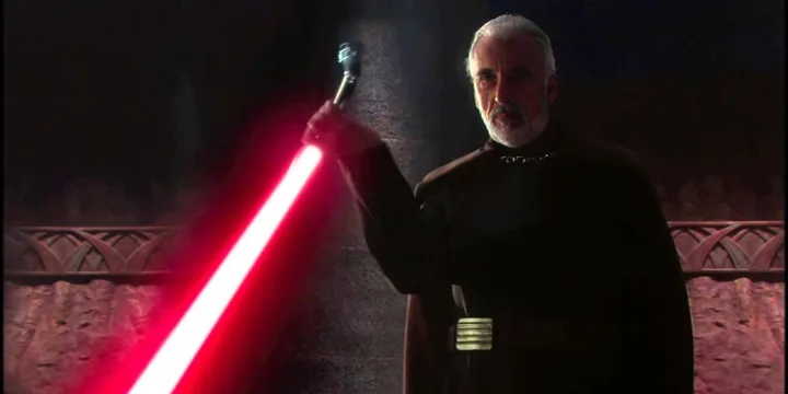 Count Dooku wielding his curved-hilt red lightsaber in a dramatic indoor setting.