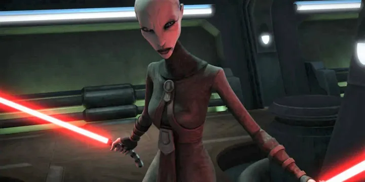 Animated alien female character dual-wielding two curved red lightsabers aboard a ship interior.