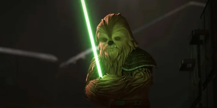 Animated Wookiee character clutching a green lightsaber in a dark, dramatic setting.