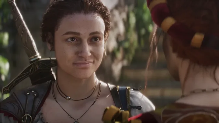 Close-up cinematic of a female warrior character smiling in a fantasy RPG cutscene.
