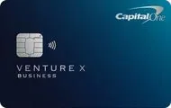 Capital One Venture X Business credit card on a dark blue background.