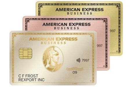 Three American Express Business Gold cards in gold, rose gold, and white variants fanned out.